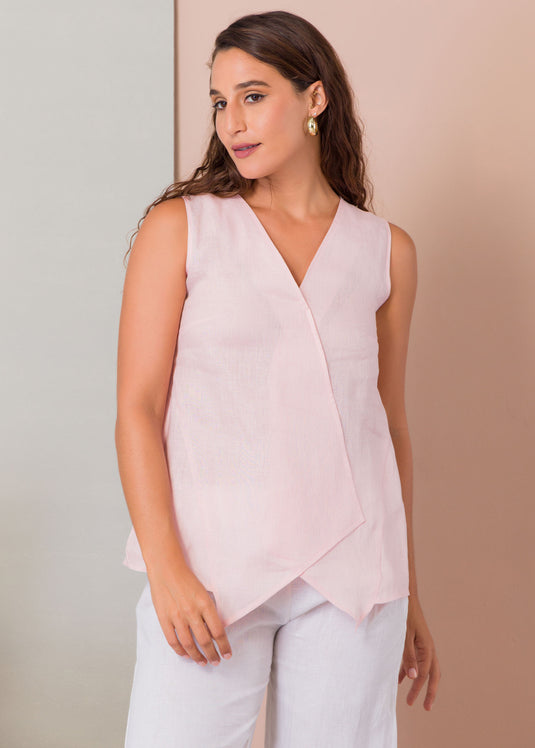 Sleeveless blouse with mock cross over panel