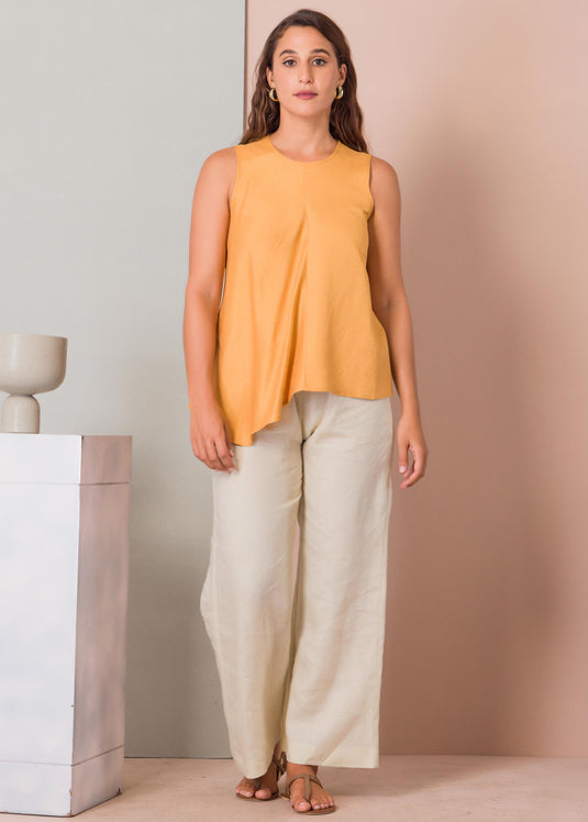 Sleeveless blouse with asymmetrical panel