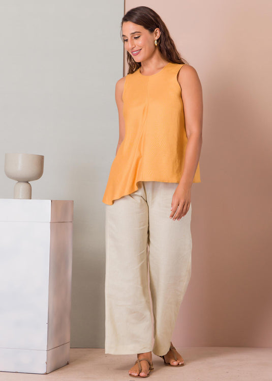 Sleeveless blouse with asymmetrical panel