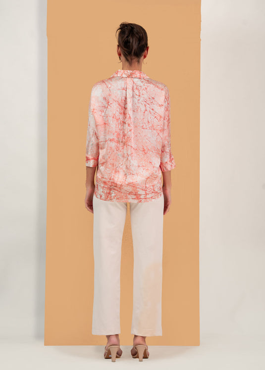 Batik blouse detailed with tropical leaves