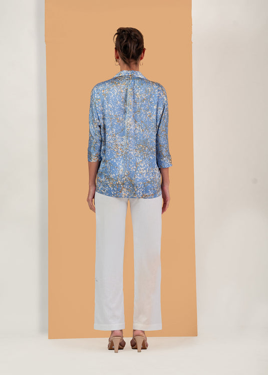 Batik blouse detailed with tropical leaves
