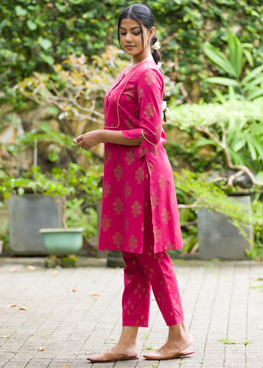 Printed kurtha top with gold colour piping