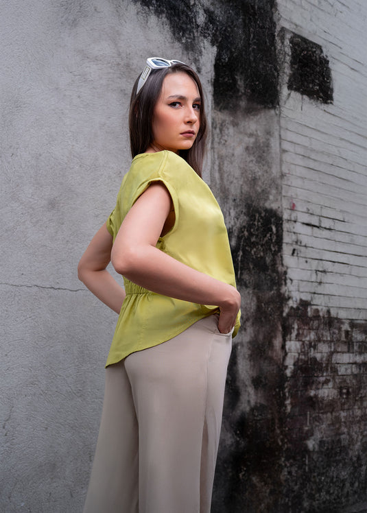 Blouse with elasticated back