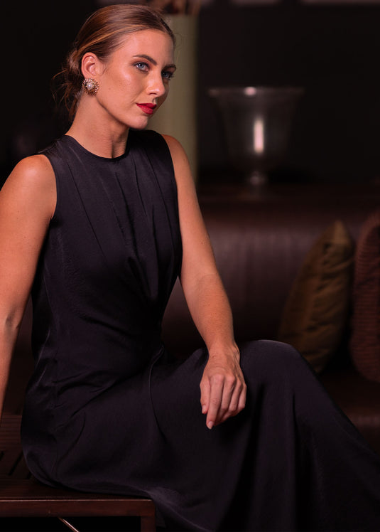 Sleeveless asymmetrical dress with side drape