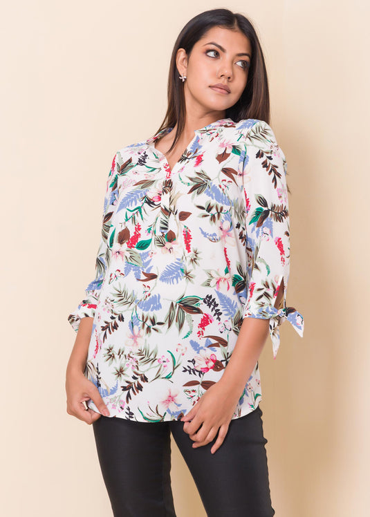 Floral printed blouse with sleeve ties