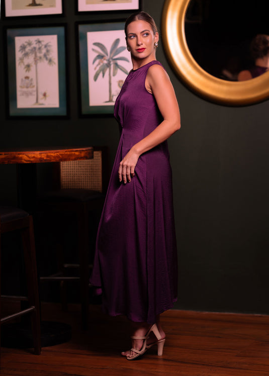 Sleeveless asymmetrical dress with side drape