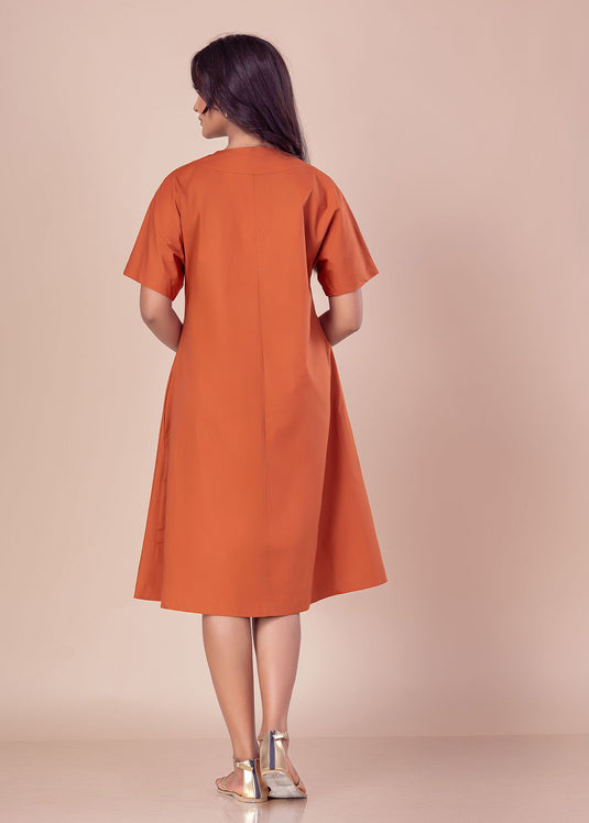 Knee length V neck dress with front pleat