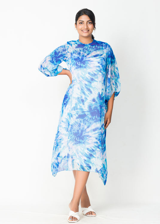 Uneven hem detailed printed dress