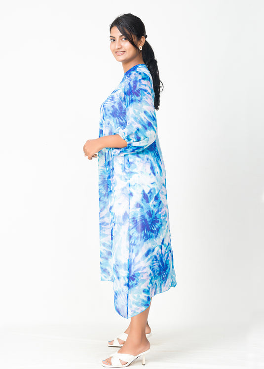 Uneven hem detailed printed dress