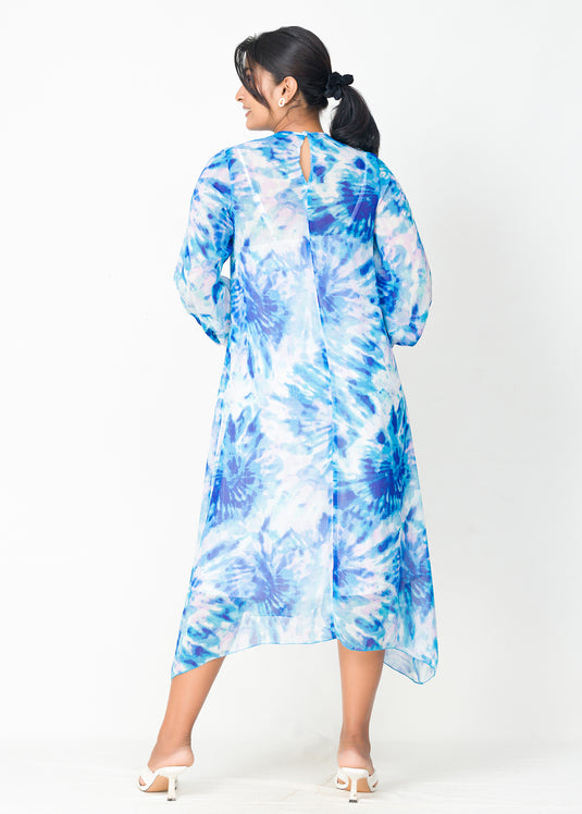 Uneven hem detailed printed dress